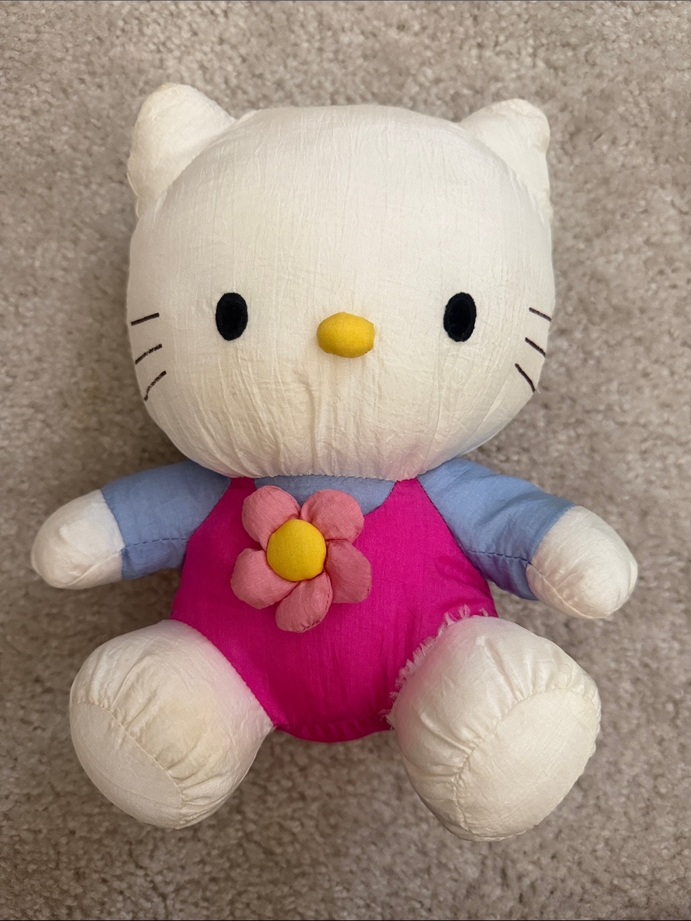 Old Plush Hello Kitty Doll with Pink Outfit and Flower Accent